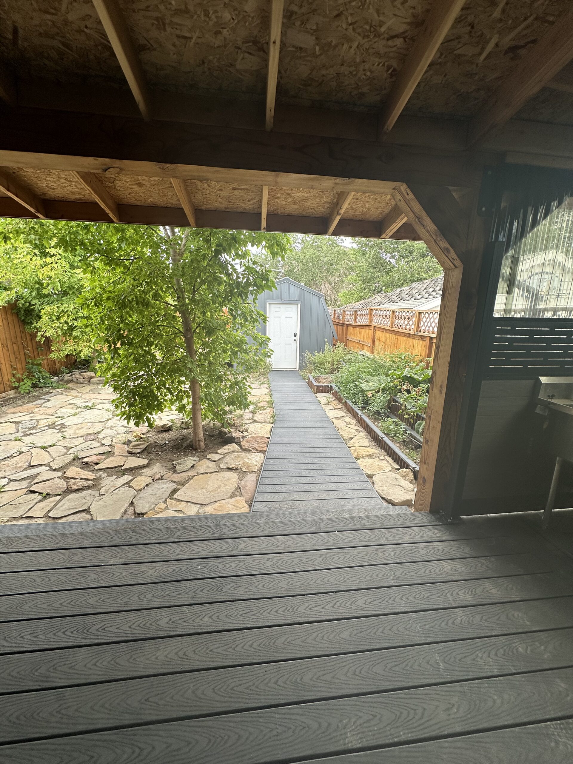128 Duchesne St. Helper, Utah Large backyard covered deck — for morning coffee, dinner outside, and watching the yard under those mature trees. Lots of garden beds ready and waiting for your tomatoes, flowers and herbs.<br />